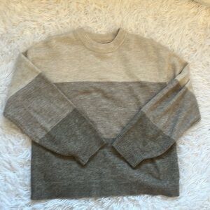 This is an H&M cream striped sweater in size Xsmall